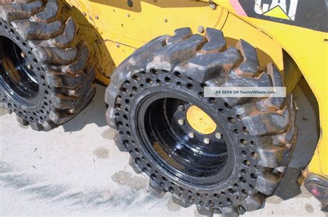 cat rubber tire skid steer|cat skid steer solid tires.